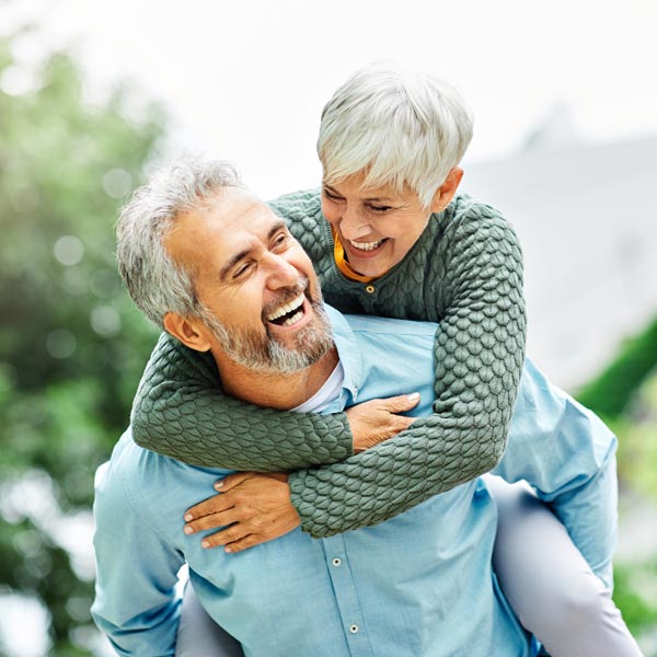 senior couple smiling