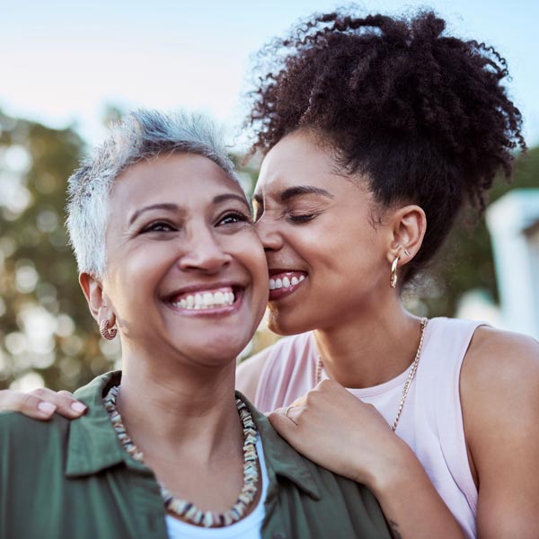 mother and daughter laughing